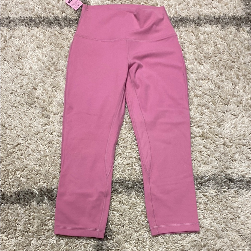 31 -Lululemon Align High-Rise Crop 21"
Pink Peony (pink not confirmed) -size 6